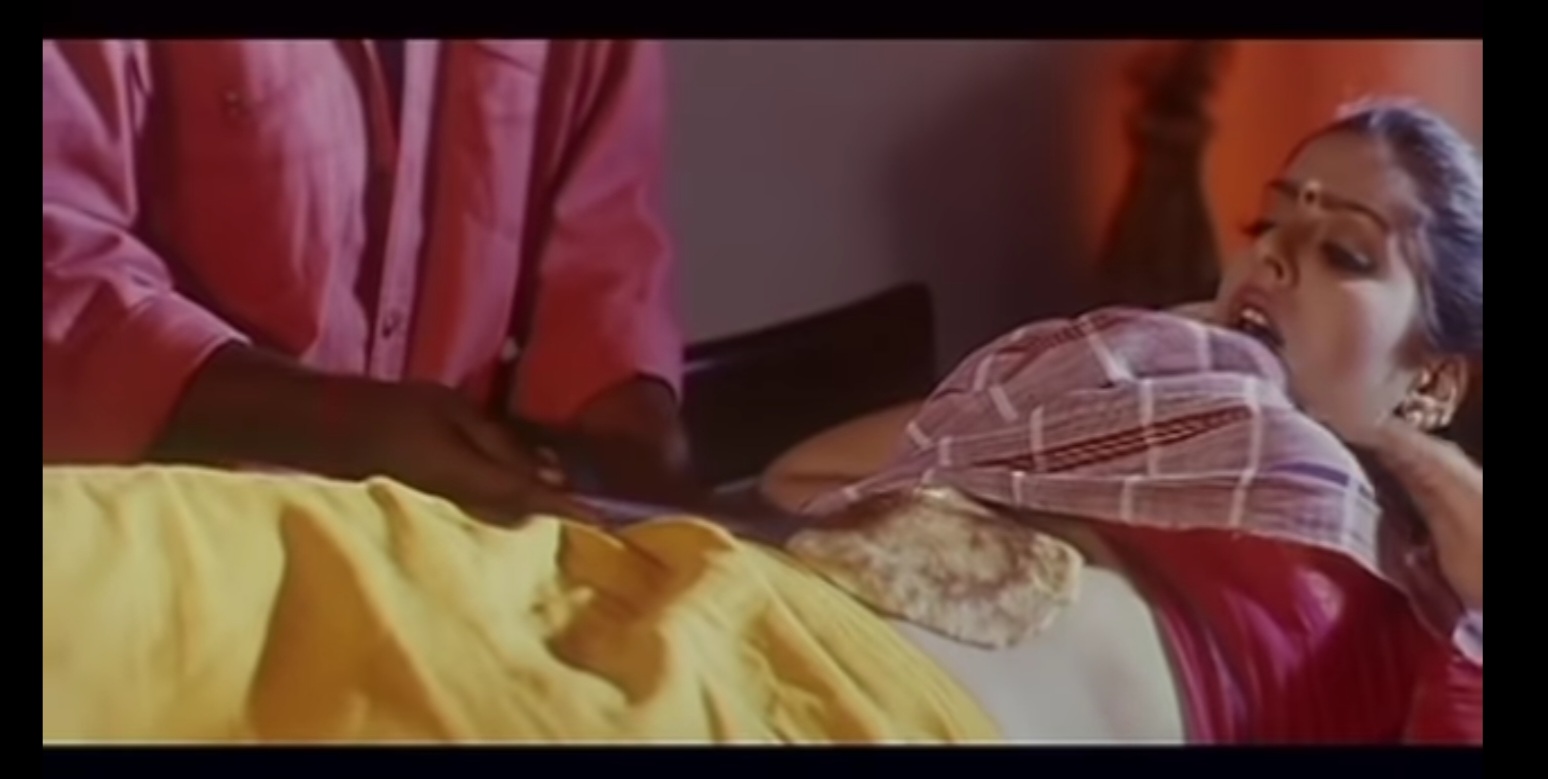 A man cooks an omlette on a woman's belly