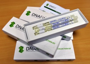 A pile of DNA collection kits in white boxes