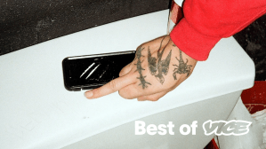 Man giving finger next to lines