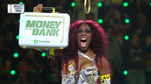 WWE Money in the Bank: Naomi wins briefcase, holding it high